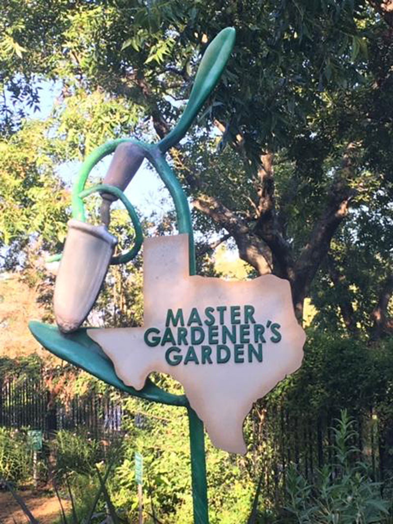 Texas shaped sign for Master Gardener's Garden at TDG